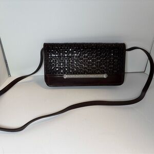 Dark brown clutch bag by Brighton with silver accents, snap off strap